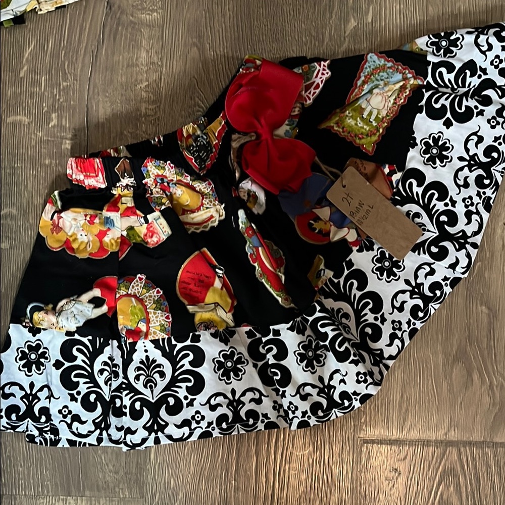 Black and White Skirt with Red Bow